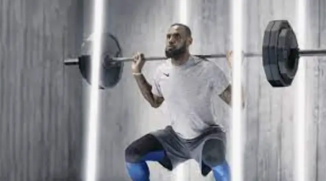 Basketball Players Lifting Weights